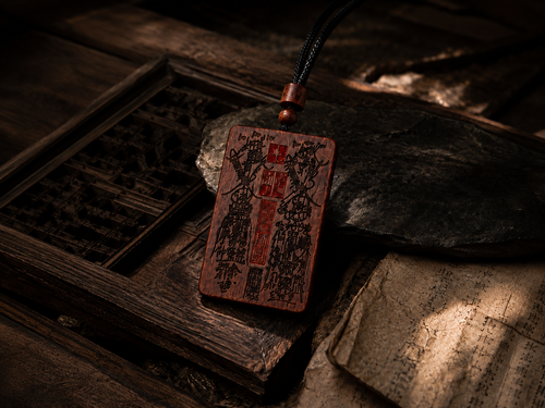 Carved wooden talisman pendant